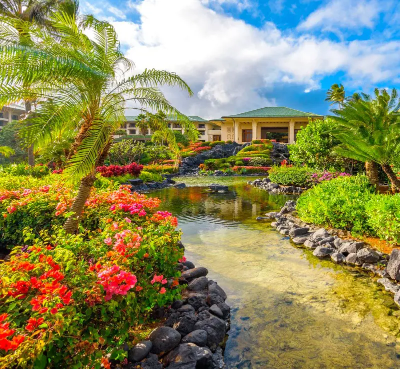 A calm stream and a beautiful garden at Grand Hyatt Kauai Resort & Spa