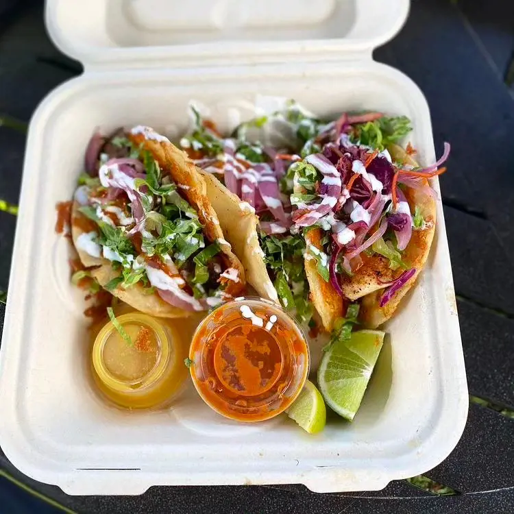 Mouthwatering tacos prepared for lunch at Alii Garden Marketplace