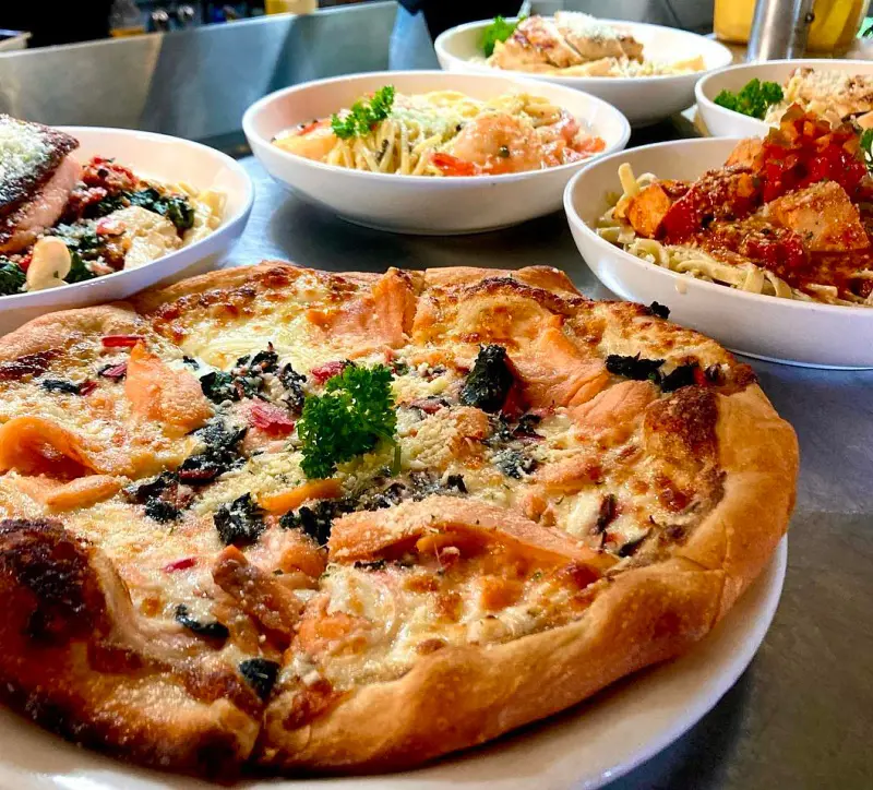 Yummy pizza served at Cafe Pesto Hilo Bay made from fresh and flavorful locally sourced ingredients