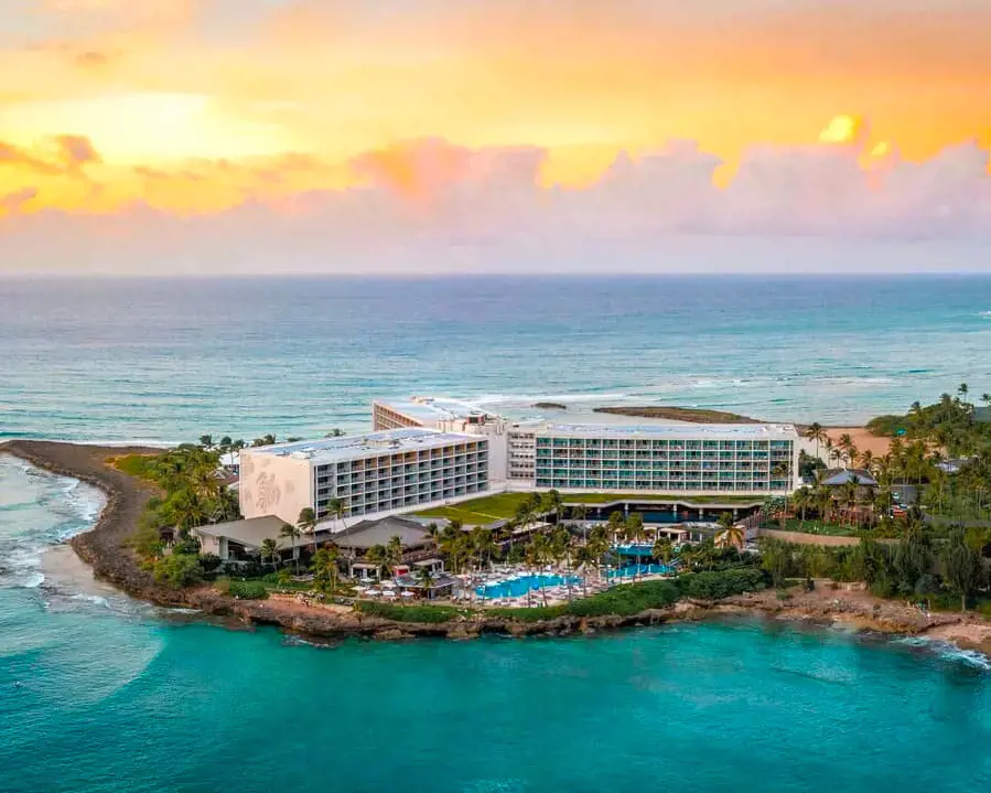 An aerial view of the unique buidling of the Turtle Bay Resort by the ocean