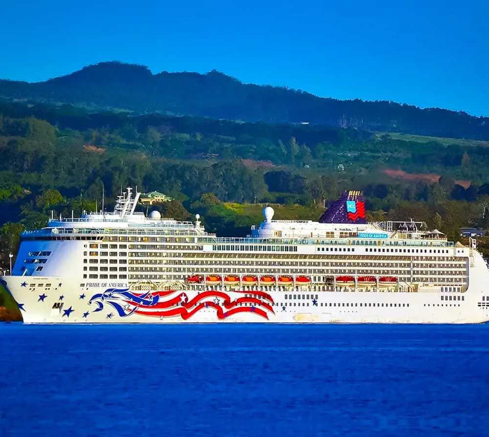 An enormous passenger ship pictured sailing in the clear blue waters in Hawaii