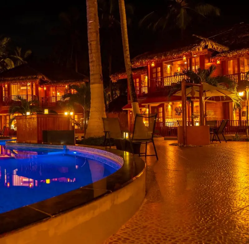 A beautiful night shot of the Coral Reef Hotel and Resort