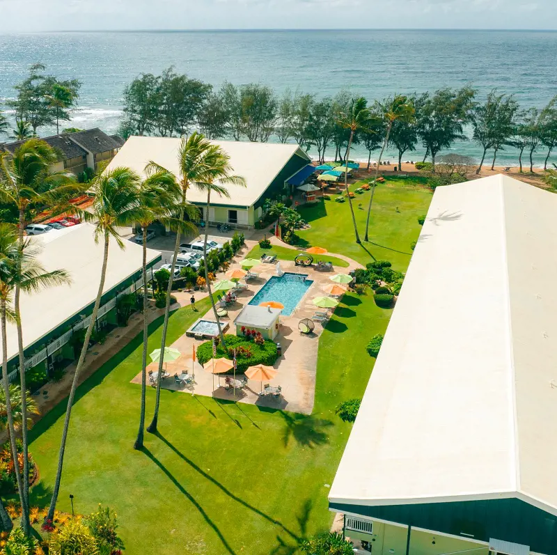 A bird's eye view of the Kauai Shores Hotel by the ocean