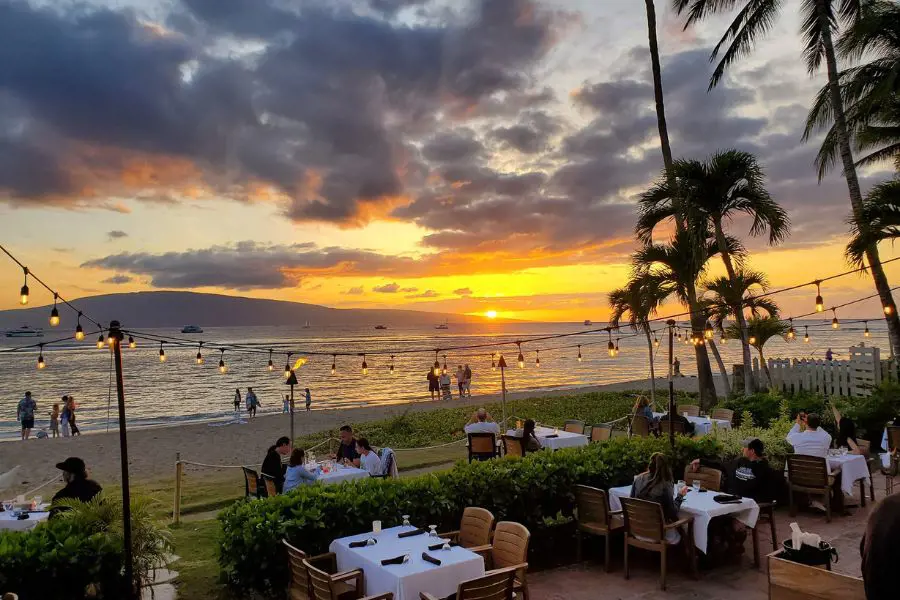 Enjoy the Maui sunset while eating your favorite dish at Pacific'o On The Beach