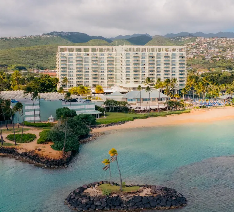 A breathtaking view of The Kahala Hotel & Resort by the pristine beach in Honolulu