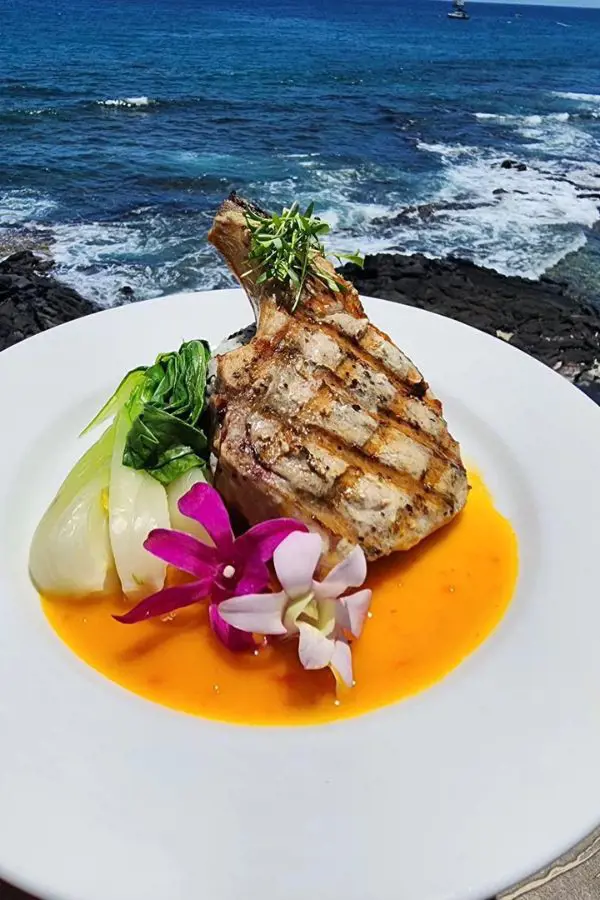 Enjoy your favorite cuisine by the ocean at Papa Kona Restaurant & Bar