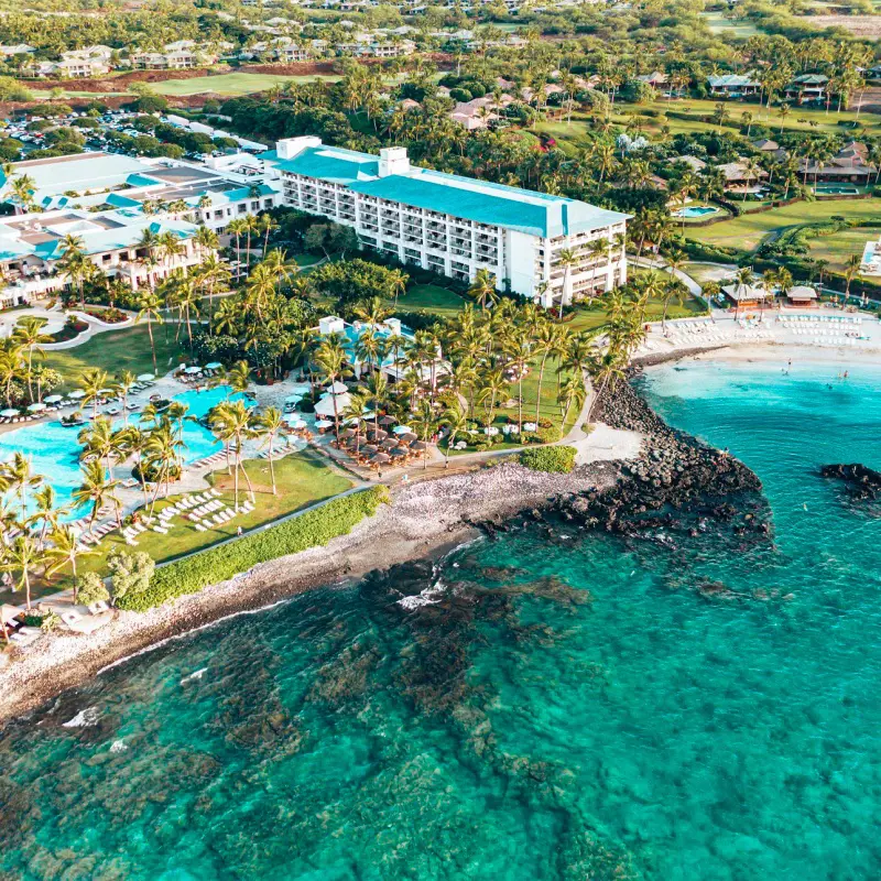 An aerial view of the Fairmont Orchid, Hawaii and its private lagoon in front
