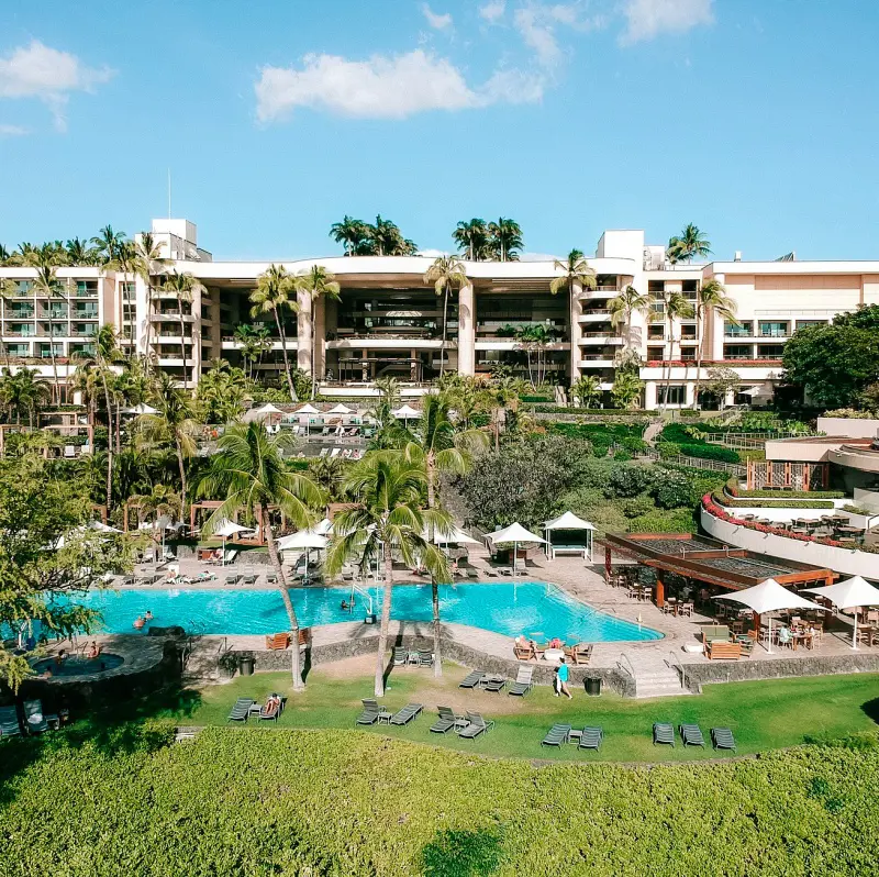 A full front view of The Westin Hapuna Beach Resort and its lush surrounding
